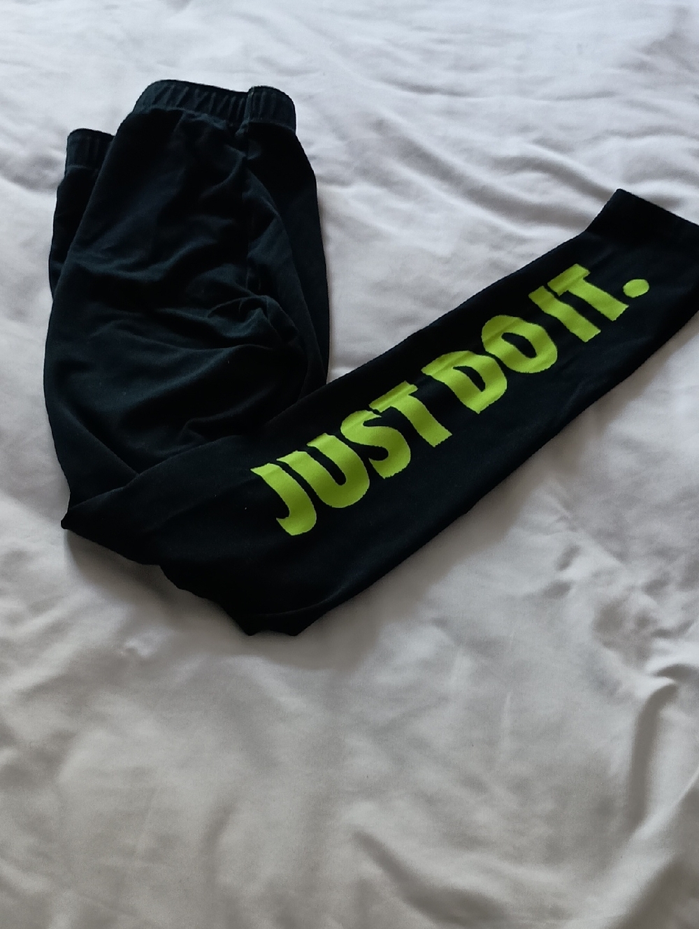 Nike Kids Black Sweatpants with Neon Green "JUST DO IT." Leg Logo